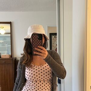 White Bucket Hat with Subtle Pink Script